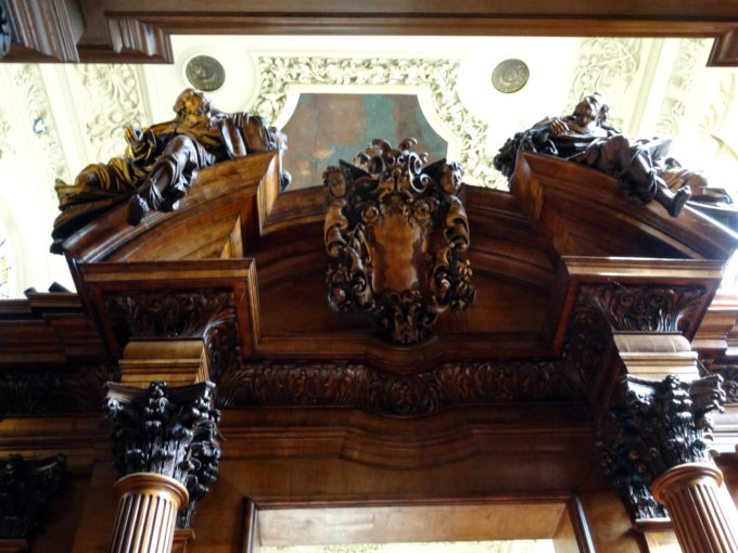 photo of apostles atop the screen - seen from the vestibule